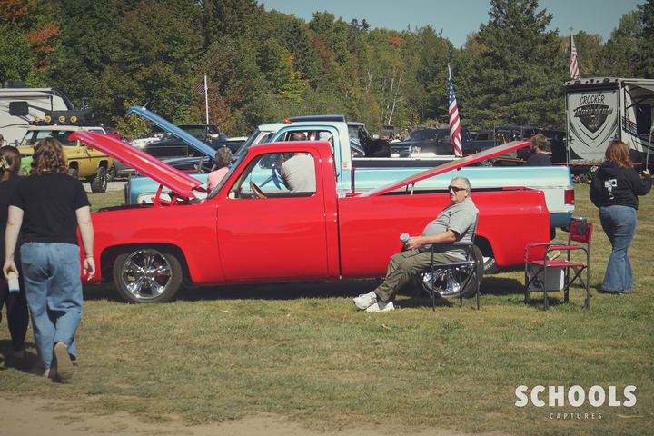 Red truck with people